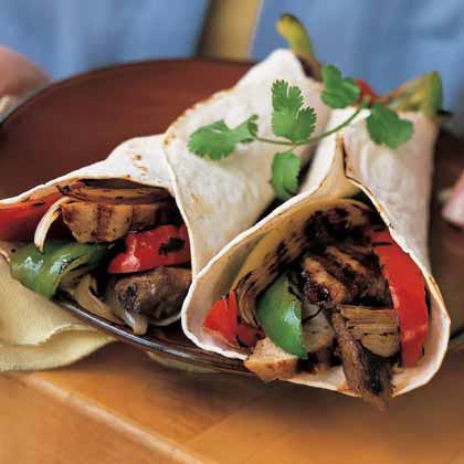 Beef-and-Chicken Fajitas with Peppers and Onions Beef-and-Chicken Fajitas with Peppers and Onions