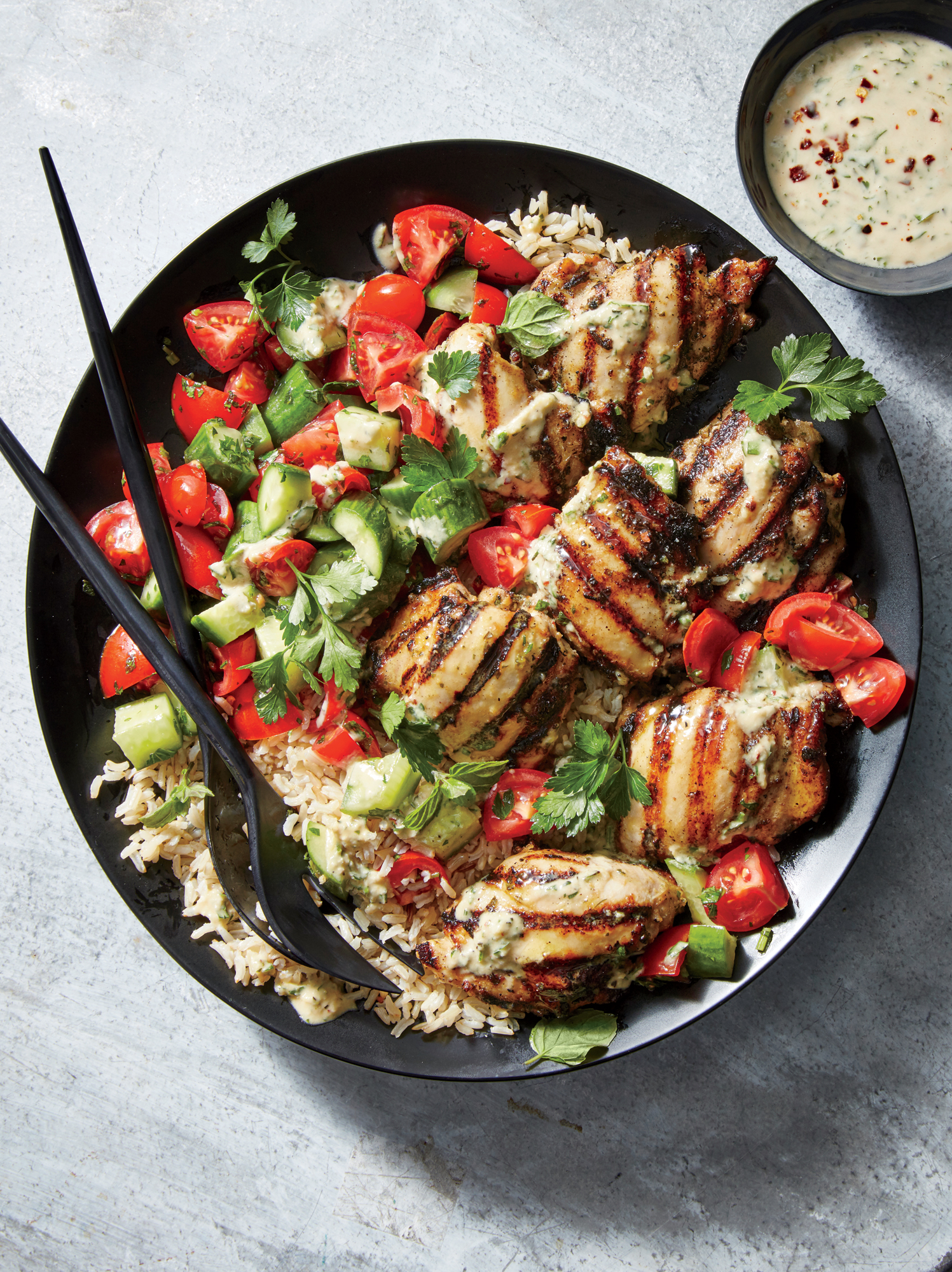Tahini-Marinated Chicken Thighs with Cucumber-and-Tomato Salad