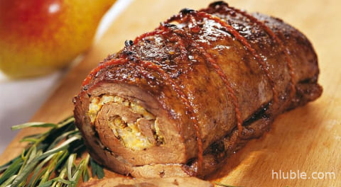 Meat loaf with mushrooms in bacon