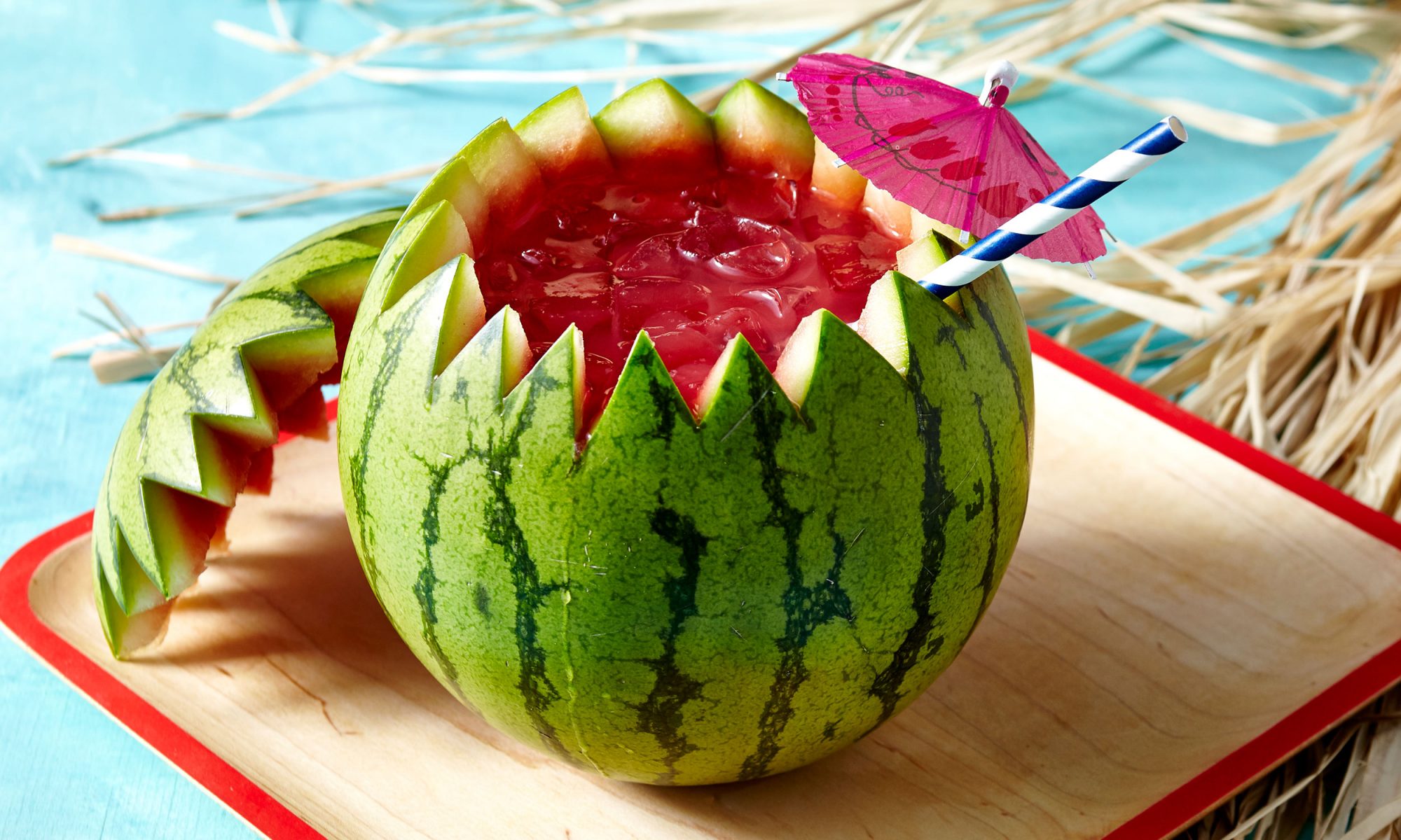 Sip Watermelon Rum Punch Directly from the Fruit