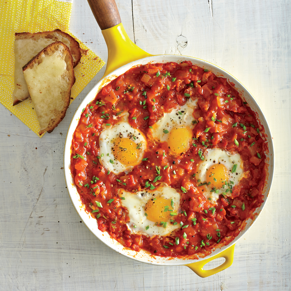 Eggs Poached in Tomato Sauce with Garlic Cheese Toasts Eggs Poached in Tomato Sauce with Garlic Cheese Toasts